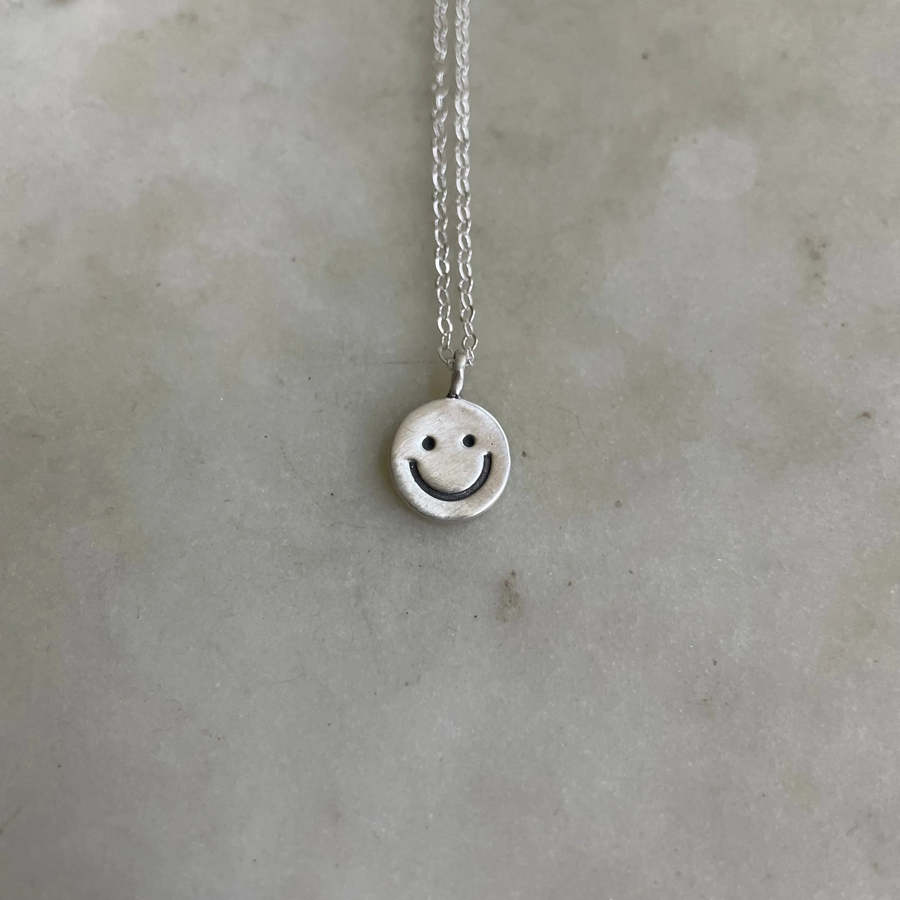 HAPPY FACE PENDANT