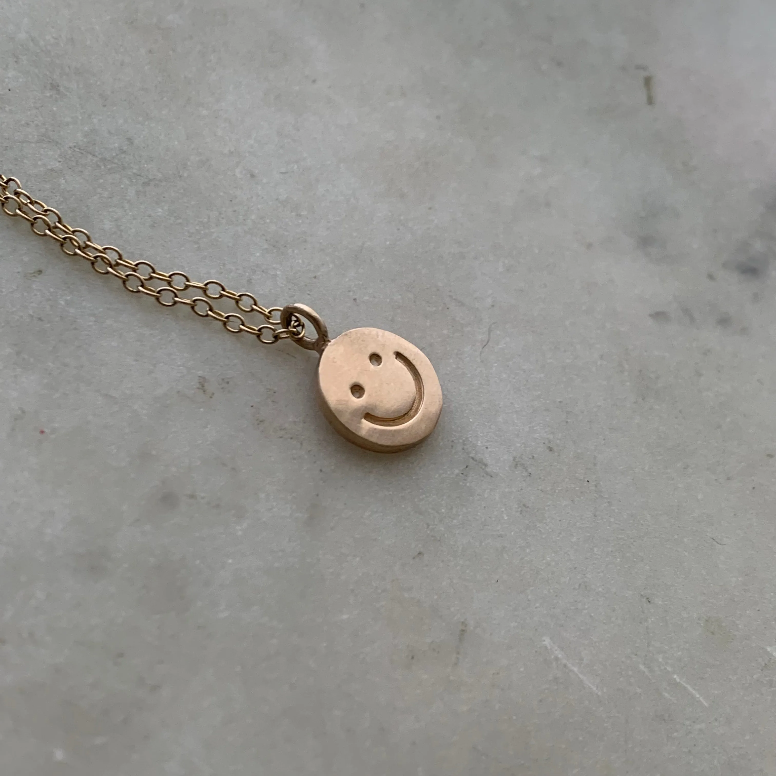 HAPPY FACE PENDANT