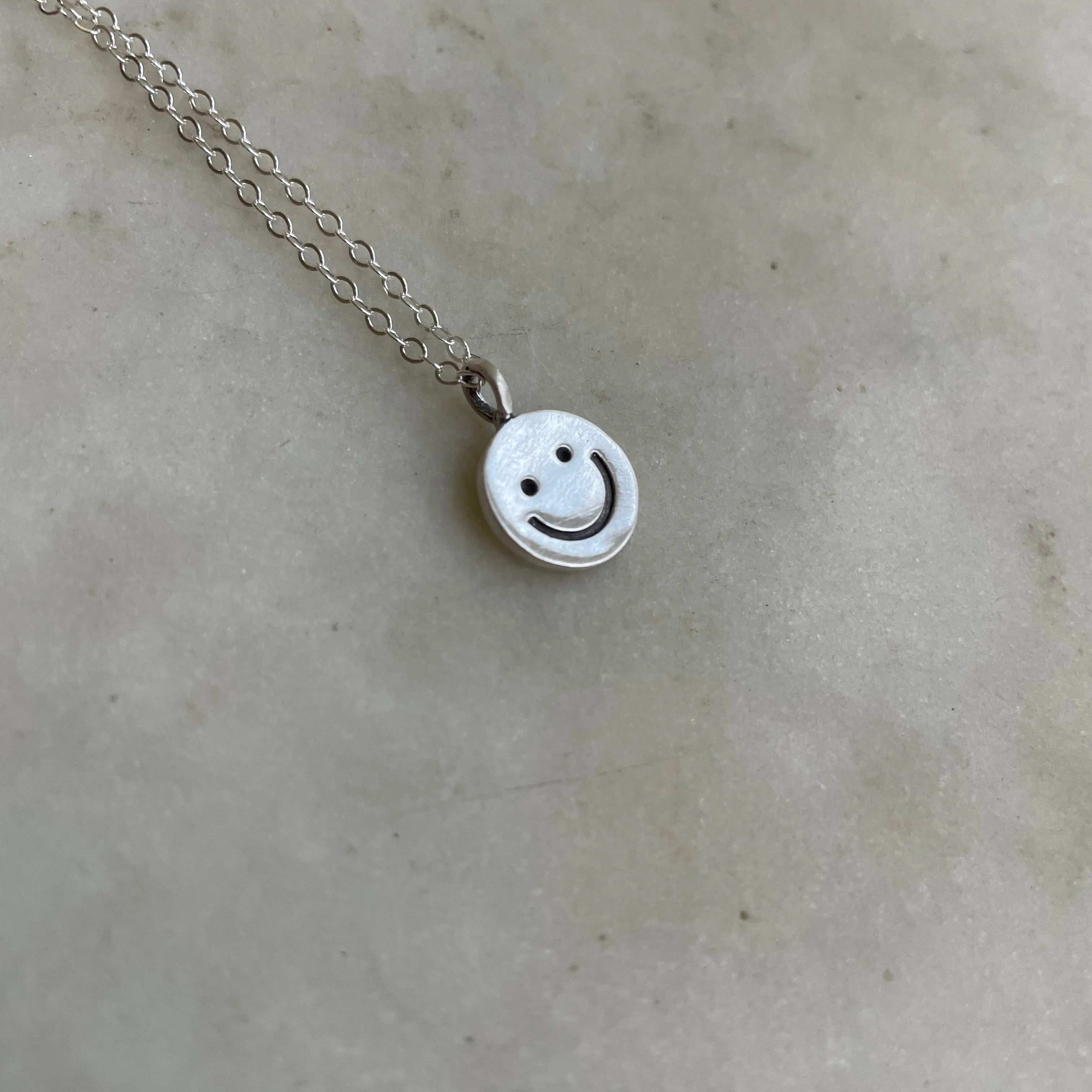 HAPPY FACE PENDANT