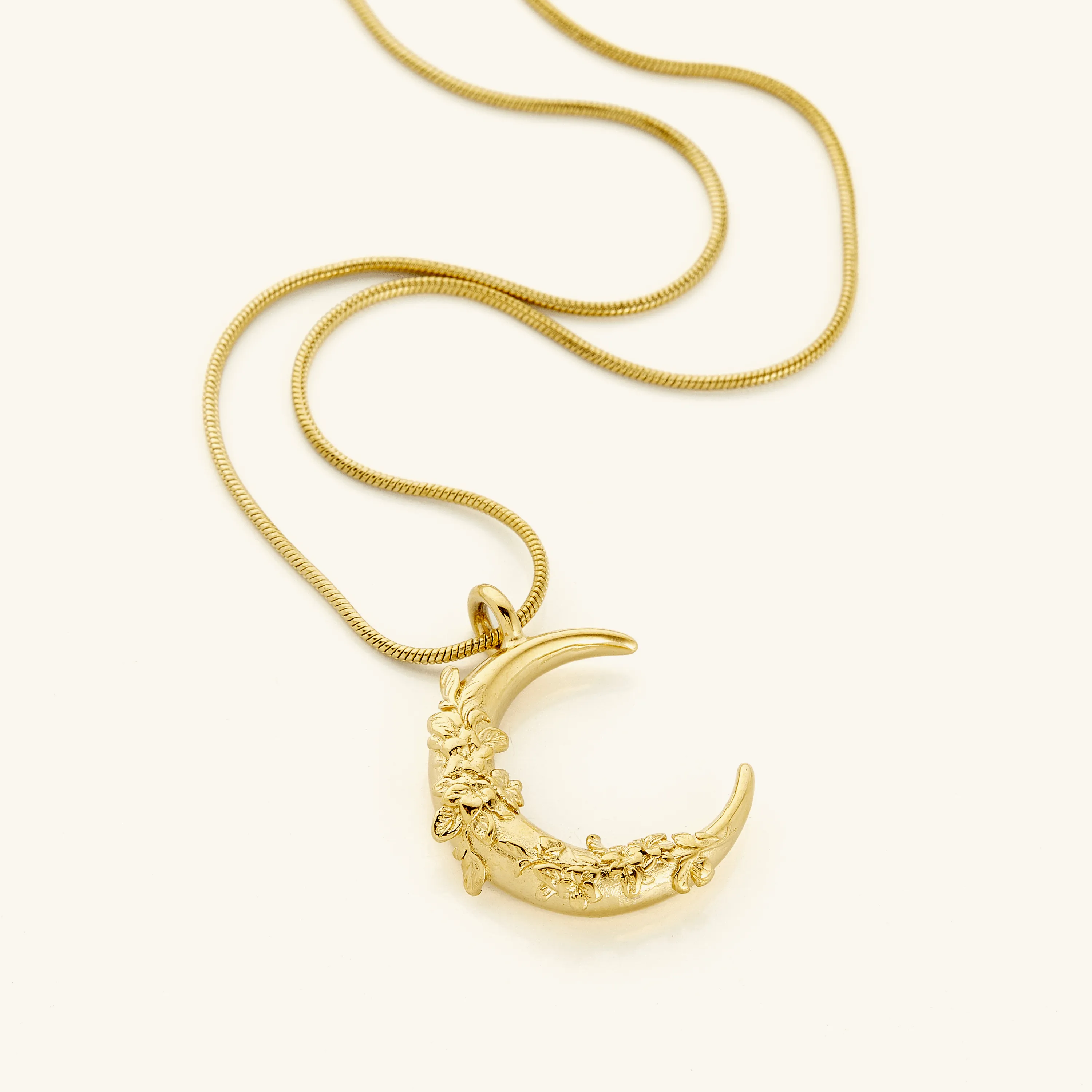 Crescent Shaped Jasmine Necklace by VELA and Nominal