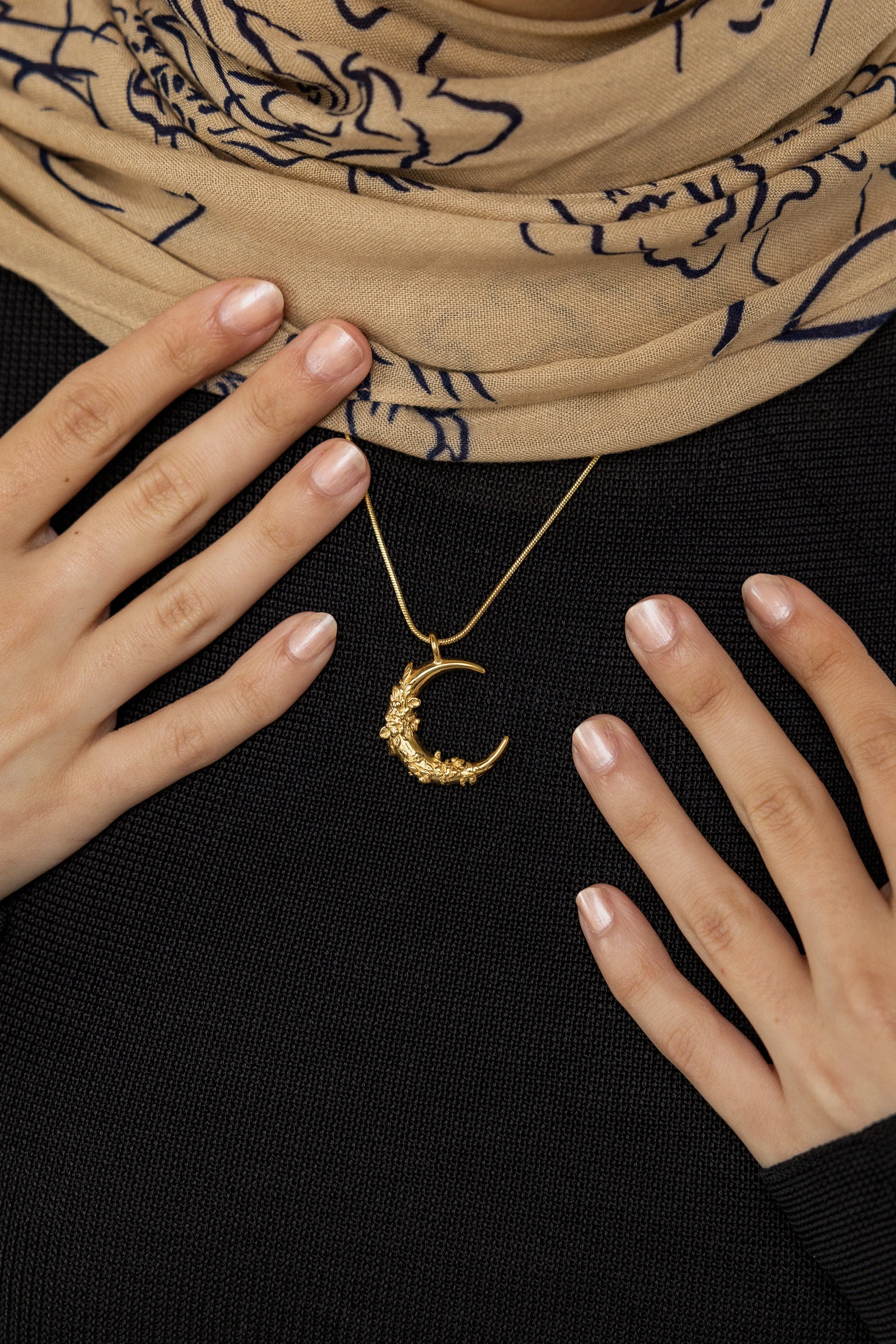 Crescent Shaped Jasmine Necklace by VELA and Nominal